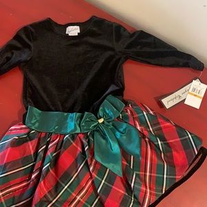 Holiday dress. Black velvet top with multicolor bottom. Great for the holiday.